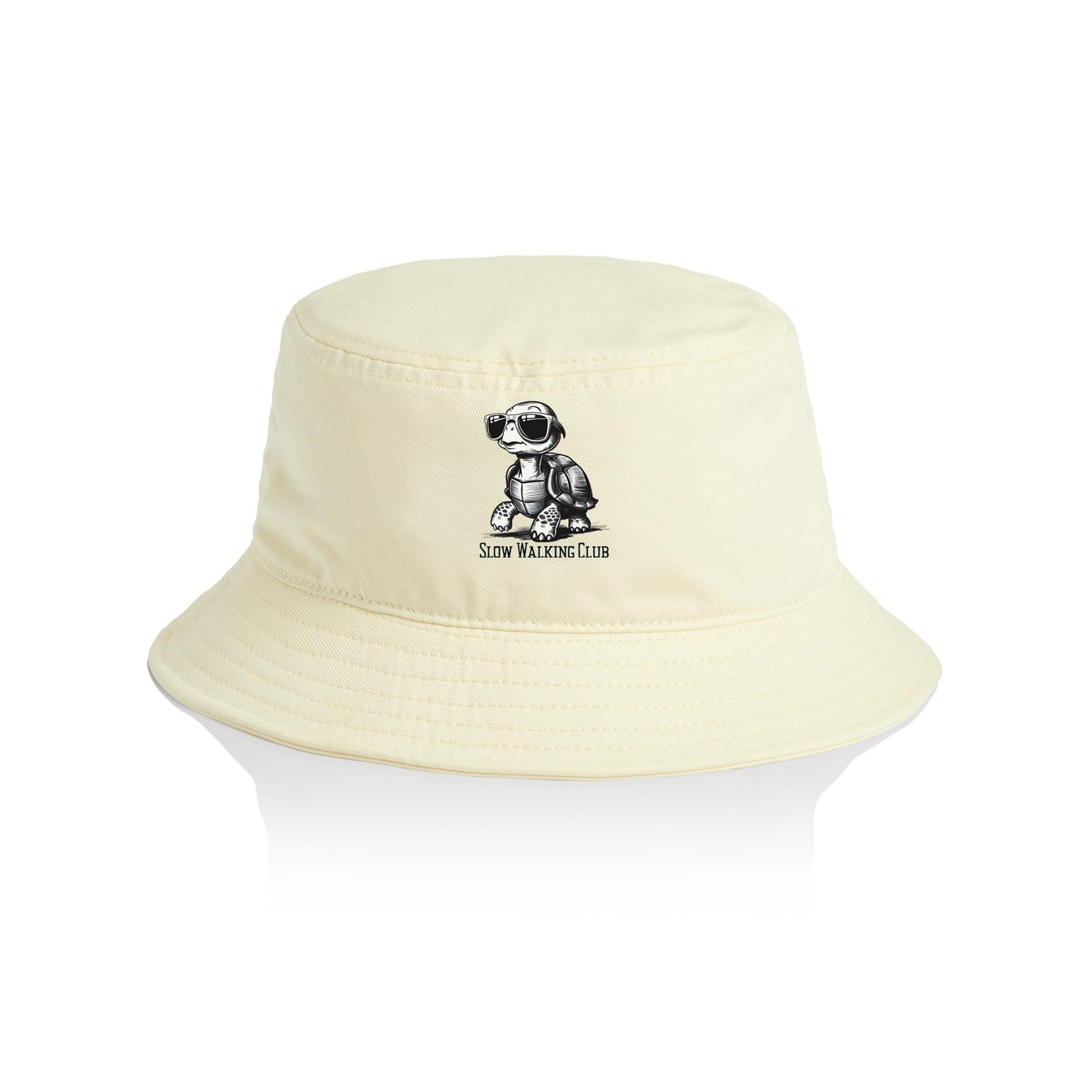 Tortoise, Slow Walking Club - AS Colour Bucket Hat Butter One Size As Colour Bucket Hat animal Printed In Australia