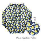 Rubber Ducks On Dark Umbrella
